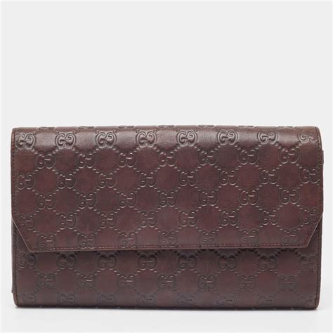 gucci brown leather clutch|gucci guccissima clutch.